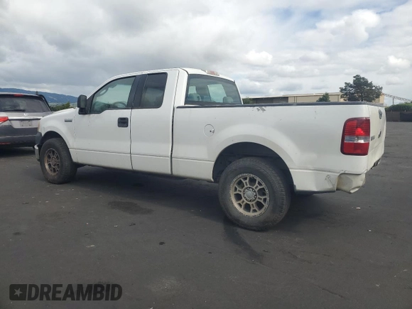 2005 Ford F-150 STX with VIN 1FTRX12W15FB65991, listed as a Copart auction lot 54858525 with 281,477 mi miles and Salvage Title. Bid and sale history available at carsss.com. Image 2.