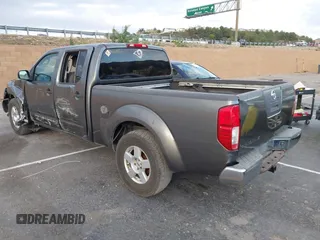 2007 Nissan Frontier SE z VIN 1N6AD09U67C411083, wystawiony jako IAAI lot #41691251 z przebiegiem 186 495 mil mil oraz . Historia ofert i sprzedaży dostępna na DreamBid. Obrazek 3.