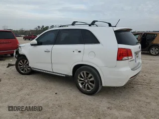 2012 Kia Sorento SX with VIN 5XYKW4A21CG303835, listed as a Copart auction lot 48239835 with 335,934 mi miles and Salvage Title. Bid and sale history available at carsss.com. Image 2.