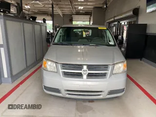 2010 Dodge Grand Caravan SE z VIN 2D4RN4DEXAR412152, wystawiony jako IAAI lot #42825395 z przebiegiem 93 398 mil mil oraz . Historia ofert i sprzedaży dostępna na DreamBid. Obrazek 2.