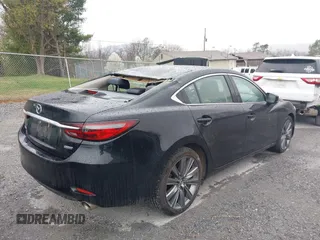 2018 Mazda 6 Touring with VIN JM1GL1VM2J1313540, listed as a IAAI auction lot 41850108 with 142,831 mi miles. Bid and sale history available at carsss.com. Image 6.