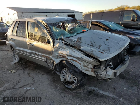 2004 Jeep Grand Cherokee Limited with VIN 1J8GX58N14C170162, listed as a Copart auction lot 74274044 with Not Provided miles and Salvage Title. Bid and sale history available at DreamBid. Image 4.
