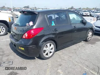 2012 Nissan Versa S with VIN 3N1BC1CP4CK203309, listed as a IAAI auction lot 41614884 with 141,770 mi miles. Bid and sale history available at carsss.com. Image 4.