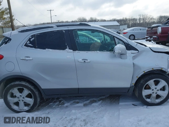 2015 Buick Encore with VIN KL4CJASB5FB257483, listed as a IAAI auction lot 41595174 with 91,826 mi miles. Bid and sale history available at carsss.com. Image 13.