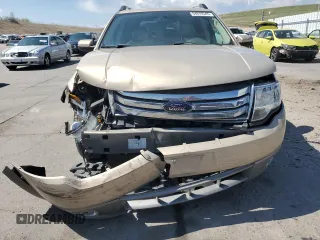 2008 Ford Taurus X SEL z VIN 1FMDK02W58GA27299, wystawiony jako Copart lot #54070345 z przebiegiem 82 629 mil mil oraz Szkoda całkowita • Salvage title. Historia ofert i sprzedaży dostępna na DreamBid. Obrazek 5.