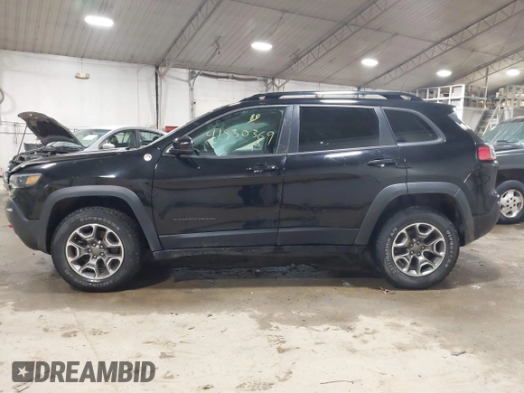 2022 Jeep Cherokee Trailhawk with VIN 1C4PJMBX8ND517236, listed as a IAAI auction lot 41530369 with 34,164 mi miles and . Bid and sale history available at DreamBid. Image 14.