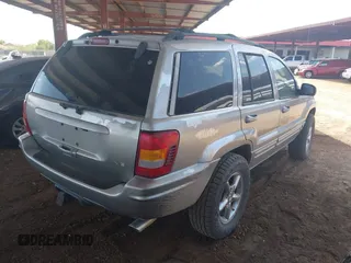 2002 Jeep Grand Cherokee Limited with VIN 1J8GW58J62C165942, listed as a IAAI auction lot 42739339 with 220,677 mi miles and . Bid and sale history available at DreamBid. Image 4.