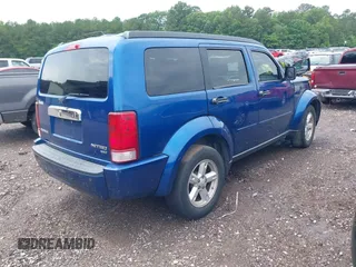 2010 Dodge Nitro SXT z VIN 1D4PT5GK0AW120120, wystawiony jako IAAI lot #42251615 z przebiegiem 114 627 mil mil oraz . Historia ofert i sprzedaży dostępna na DreamBid. Obrazek 4.
