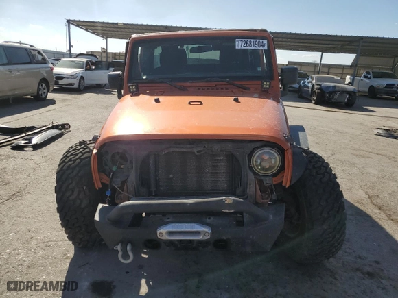 2011 Jeep Wrangler Unlimited Sahara with VIN 1J4BA5H19BL588797, listed as a Copart auction lot 72681904 with 100,763 mi miles and Salvage Title. Bid and sale history available at carsss.com. Image 5.