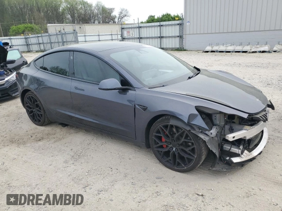 2021 Tesla Model 3 Performance with VIN 5YJ3E1EC5MF984986, listed as a Copart auction lot 52010205 with 48,012 mi miles and Salvage Title. Bid and sale history available at DreamBid. Image 4.