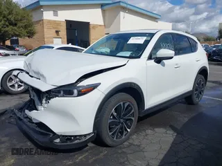 2023 Mazda CX-5 2.5 S Premium Plus Package with VIN JM3KFBEM4P0112803, listed as a IAAI auction lot 41588872 with 25,087 mi miles. Bid and sale history available at carsss.com. Image 17.