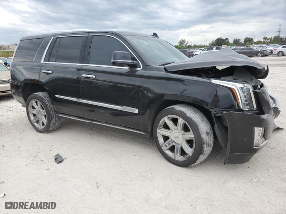 2020 Cadillac Escalade Premium Luxury with VIN 1GYS3CKJ6LR130642, listed as a Copart auction lot 48387515 with 74,707 mi miles and Salvage Title. Bid and sale history available at carsss.com. Image 4.