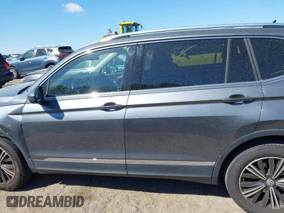 2018 Volkswagen Tiguan SEL with VIN 3VV3B7AX5JM036164, listed as a IAAI auction lot 41876403 with 108,269 mi miles and . Bid and sale history available at DreamBid. Image 14.
