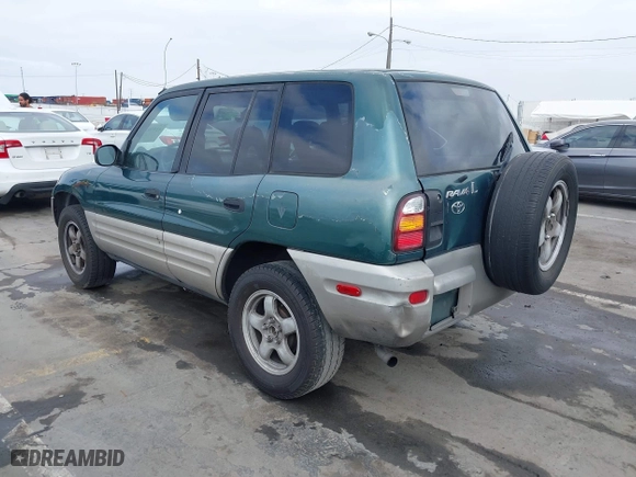 1998 Toyota RAV4 with VIN JT3GP10V9W7032820, listed as a IAAI auction lot 42046186 with 312,888 mi miles. Bid and sale history available at carsss.com. Image 3.