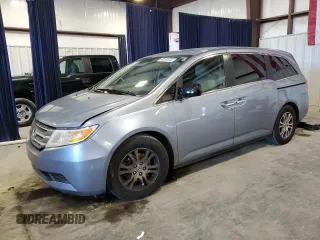 2013 Honda Odyssey EX z VIN 5FNRL5H43DB015585, wystawiony jako Copart lot #89200265 z przebiegiem 134 411 mil mil oraz Szkody całkowita. Historia ofert i sprzedaży dostępna na DreamBid. Obrazek 1.