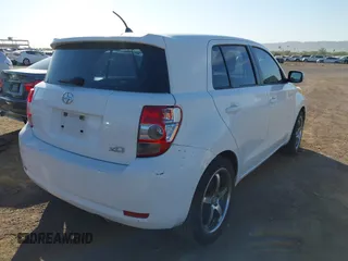 2011 Scion xD with VIN JTKKU4B49B1012447, listed as a IAAI auction lot 42026584 with 223,863 mi miles. Bid and sale history available at carsss.com. Image 4.