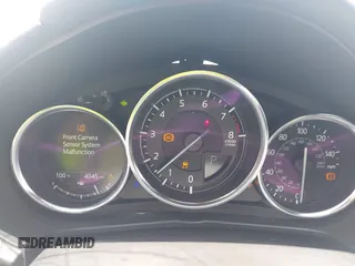 2021 Mazda MX-5 Miata Grand Touring z VIN JM1NDAM71M0457011, wystawiony jako IAAI lot #42427652 z przebiegiem 4 045 mil mil oraz . Historia ofert i sprzedaży dostępna na DreamBid. Obrazek 7.