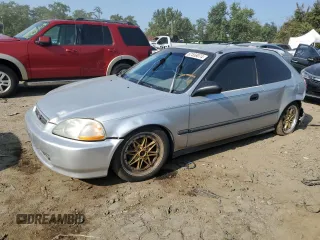 1996 Honda Civic CX with VIN 2HGEJ632XTH118948, listed as a Copart auction lot 67558074 with 172,034 mi miles and Salvage Title. Bid and sale history available at carsss.com. Image 1.