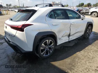 2024 Lexus UX with VIN JTHX6JBHXR2168962, listed as a Copart auction lot 51153075 with 7,080 mi miles and Salvage Title. Bid and sale history available at carsss.com. Image 3.