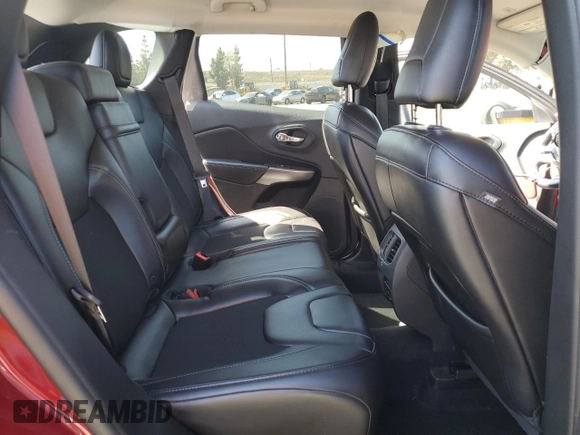 2019 Jeep Cherokee Latitude Plus z VIN 1C4PJLLB7KD308143, wystawiony jako Copart lot #61505205 z przebiegiem 94 897 mil mil oraz Szkoda całkowita • Salvage title. Historia ofert i sprzedaży dostępna na DreamBid. Obrazek 11.
