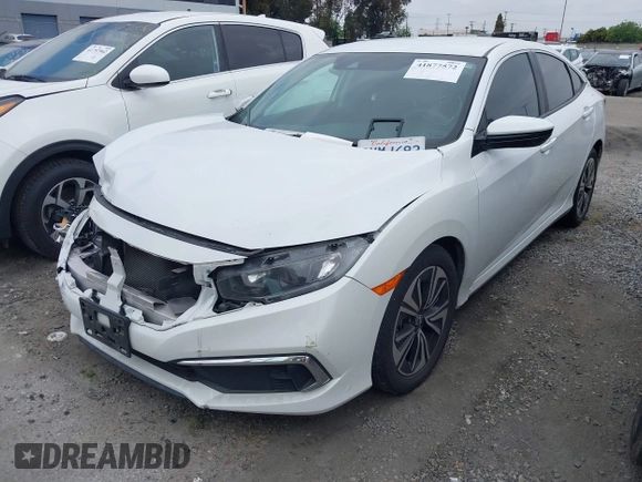 2020 Honda Civic LX with VIN 2HGFC2F64LH593100, listed as a IAAI auction lot 41877572 with 76,713 mi miles and . Bid and sale history available at DreamBid. Image 2.