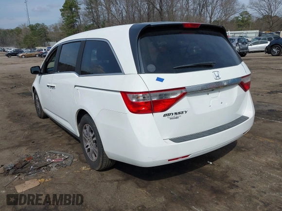 2011 Honda Odyssey EX-L with VIN 5FNRL5H67BB070541, listed as a IAAI auction lot 41812554 with 150,898 mi miles and . Bid and sale history available at DreamBid. Image 3.