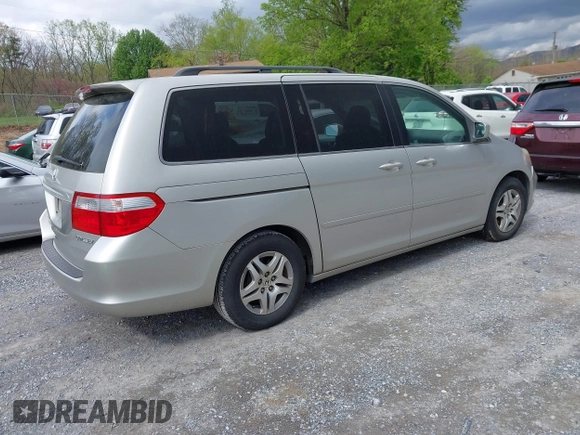 2005 Honda Odyssey EX-L with VIN 5FNRL38795B083325, listed as a IAAI auction lot 42034632 with 183,865 mi miles. Bid and sale history available at carsss.com. Image 4.
