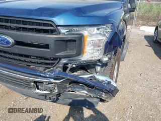 2019 Ford F-150 XL with VIN 1FTEX1EB9KKC09133, listed as a IAAI auction lot 40319582 with 151,728 mi miles. Bid and sale history available at carsss.com. Image 6.