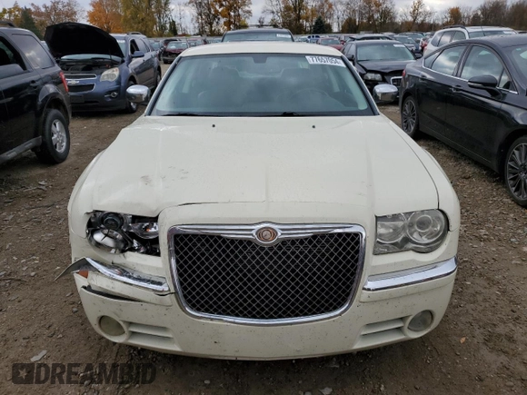 2009 Chrysler 300 Limited with VIN 2C3KA33V39H590917, listed as a Copart auction lot 77657054 with 180,613 mi miles and Clean Title. Bid and sale history available at carsss.com. Image 5.