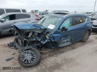 2019 Mazda CX-5 Touring with VIN JM3KFACM0K1509957, listed as a IAAI auction lot 41532933 with NaN miles. Bid and sale history available at carsss.com. Image 16.