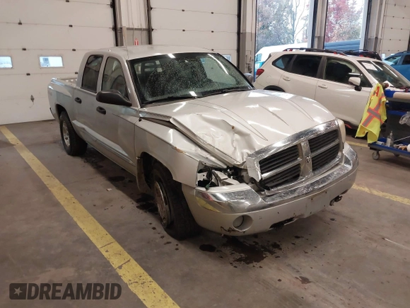 2005 Dodge Dakota Laramie with VIN 1D7HW58N75S188127, listed as a IAAI auction lot 41209206 with 117,480 mi miles and . Bid and sale history available at DreamBid. Image 1.