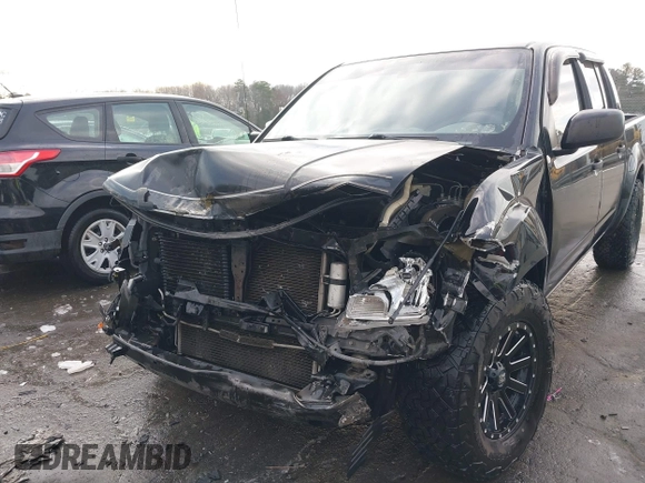 2014 Nissan Frontier SV with VIN 1N6AD0ER9EN715608, listed as a IAAI auction lot 41306919 with 181,107 mi miles and . Bid and sale history available at DreamBid. Image 6.