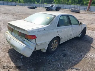 2000 Toyota Camry CE with VIN JT2BG22K3Y0471420, listed as a IAAI auction lot 42042973 with 1 mi miles. Bid and sale history available at carsss.com. Image 4.