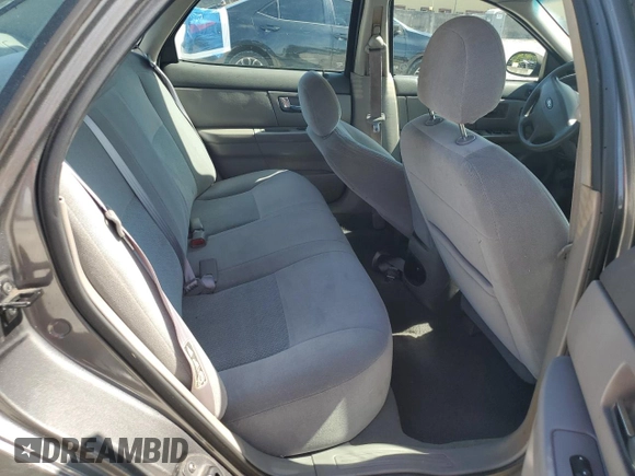 2003 Ford Taurus z VIN 1FAFP52243A153793, wystawiony jako Copart lot #55254105 z przebiegiem 89 668 mil mil oraz Szkody całkowita. Historia ofert i sprzedaży dostępna na DreamBid. Obrazek 10.