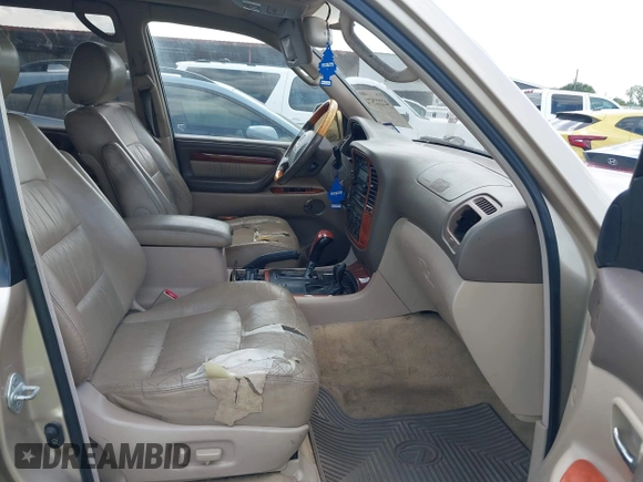 2001 Lexus LX 470 with VIN JTJHT00W713511796, listed as a IAAI auction lot 42222574 with 297,427 mi miles and . Bid and sale history available at carsss.com. Image 5.