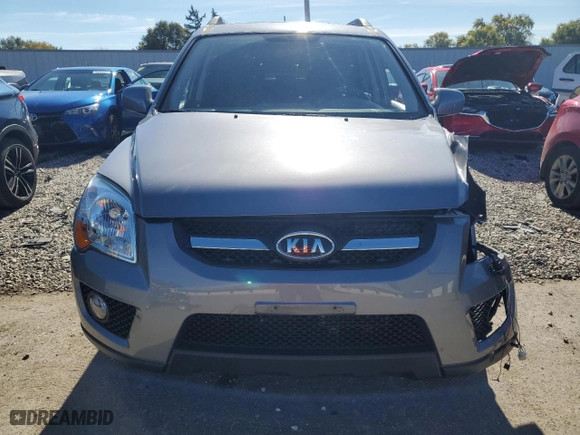 2009 Kia Sportage LX with VIN KNDJF723997613404, listed as a Copart auction lot 75807714 with 65,200 mi miles and Clean Title. Bid and sale history available at carsss.com. Image 5.