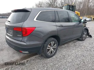 2017 Honda Pilot EX-L with VIN 5FNYF6H59HB029160, listed as a IAAI auction lot 41557192 with 157,153 mi miles and . Bid and sale history available at DreamBid. Image 4.
