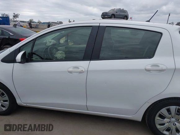 2013 Toyota Yaris L with VIN JTDKTUD38DD570483, listed as a IAAI auction lot 42071550 with 65,186 mi miles and . Bid and sale history available at DreamBid. Image 14.