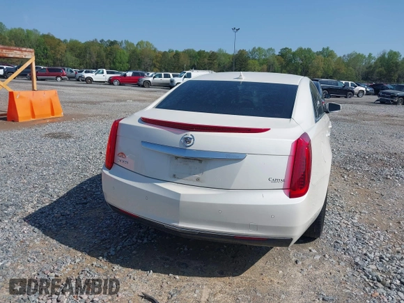 2014 Cadillac XTS with VIN 2G61L5S3XE9231858, listed as a IAAI auction lot 41941564 with 158,479 mi miles. Bid and sale history available at carsss.com. Image 16.