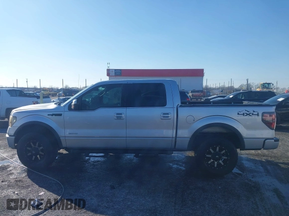 2011 Ford F-150 XLT with VIN 1FTFW1ET4BFB82920, listed as a IAAI auction lot 41213057 with 187,485 mi miles and . Bid and sale history available at carsss.com. Image 14.