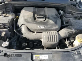 2014 Jeep Grand Cherokee Limited with VIN 1C4RJFBG4EC299273, listed as a Copart auction lot 59660695 with 162,528 mi miles and Salvage title. Bid and sale history available at DreamBid. Image 12.