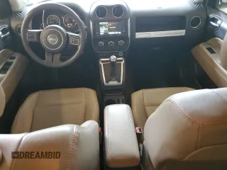 2014 Jeep Compass Latitude with VIN 1C4NJDEB1ED661332, listed as a Copart auction lot 53958985 with 116,020 mi miles and Salvage Title. Bid and sale history available at DreamBid. Image 8.