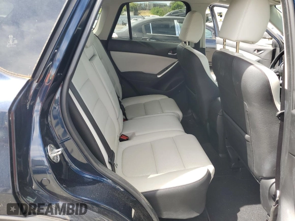 2016 Mazda CX-5 Grand Touring with VIN JM3KE4DY4G0750939, listed as a Copart auction lot 52727395 with 72,428 mi miles and Salvage Title. Bid and sale history available at carsss.com. Image 11.