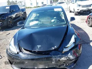 2018 Tesla Model 3 Long Range Battery with VIN 5YJ3E1EB9JF183920, listed as a IAAI auction lot 41657742 with 107,358 mi miles and . Bid and sale history available at DreamBid. Image 11.