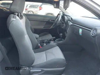 2014 Scion tC with VIN JTKJF5C7XE3079765, listed as a IAAI auction lot 41210220 with 114,410 mi miles. Bid and sale history available at carsss.com. Image 5.
