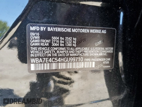 2017 BMW 7 Series 740i xDrive with VIN WBA7E4C54HGU99710, listed as a Copart auction lot 69572544 with 0 mi miles and Salvage Title. Bid and sale history available at carsss.com. Image 14.