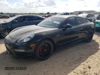 2016 Porsche Panamera Turbo with VIN WP0AC2A75GL070184, listed as a Copart auction lot 77879374 with 52,659 mi miles and Salvage Title. Bid and sale history available at carsss.com. Image 1.