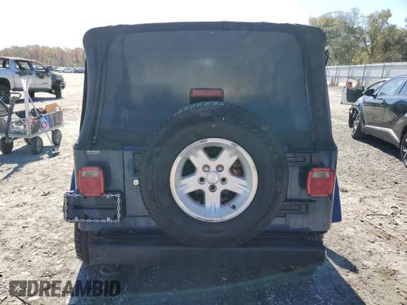 2005 Jeep Wrangler X with VIN 1J4FA39S75P374255, listed as a Copart auction lot 51298675 with Not provided miles and Salvage title. Bid and sale history available at DreamBid. Image 6.