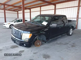 2014 Ford F-150 XL with VIN 1FTFW1CF9EKF87745, listed as a IAAI auction lot 42026883 with 221,307 mi miles. Bid and sale history available at carsss.com. Image 2.