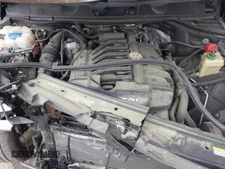 2014 Volkswagen Touareg Sport with VIN WVGEF9BP2ED007904, listed as a IAAI auction lot 41960811 with 126,230 mi miles and . Bid and sale history available at DreamBid. Image 10.